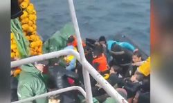 Kuşadası'nda botları sürüklenen düzensiz göçmenleri balıkçılar kurtardı