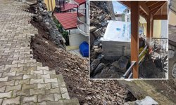 Çöken istinat duvarı evlere zarar veriyor
