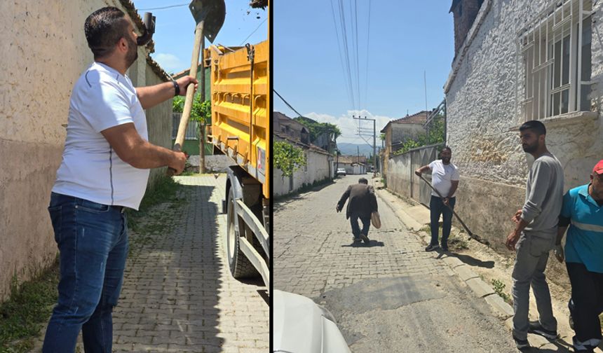 İmamköy muhtarı elinde kürek mahalleyi temizliyor