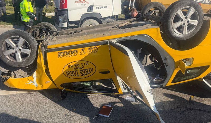 Aydın’da taksi bariyerlere çarparak takla attı